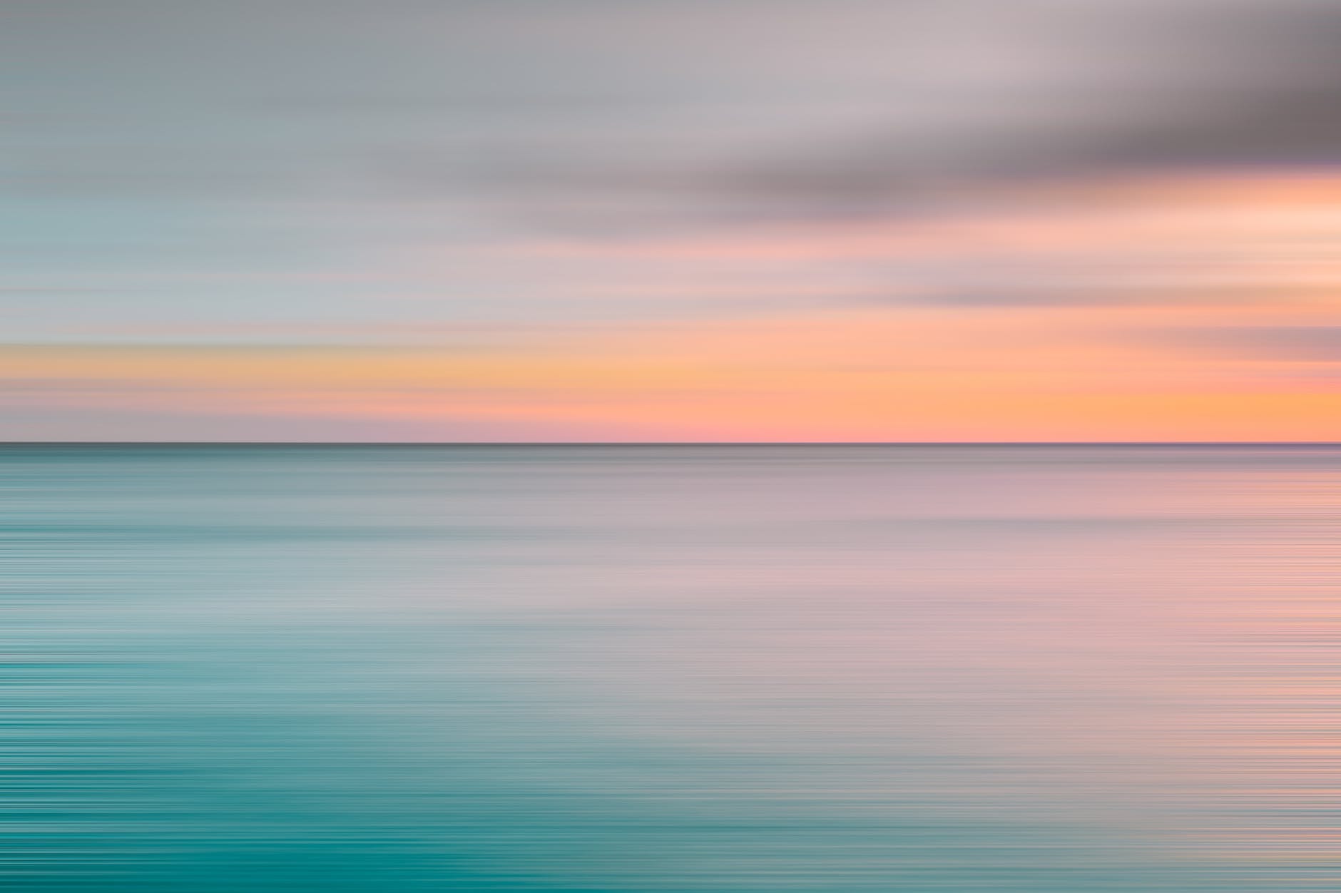 blue sea under blue sky